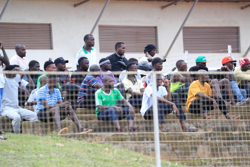 Fans and spectators watching FUFA Academies League match in Kampala