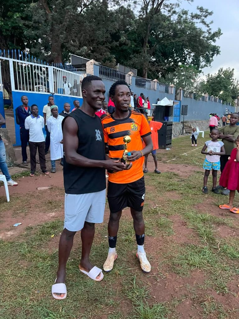 Yossam Ssembalirwa receiving his Most Valuable Player (MVP) award at the Odongo Independence Cup final.